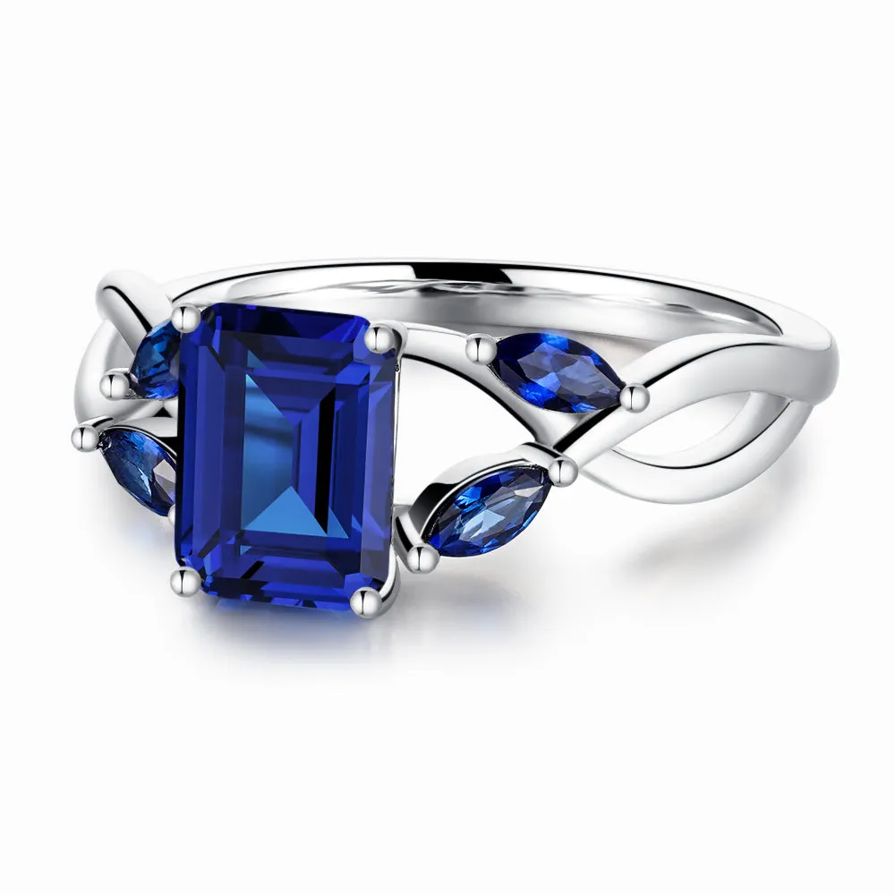 2 CT. Emerald Cut Lab Grown Sapphire Ring with Marquise Sapphire Accents