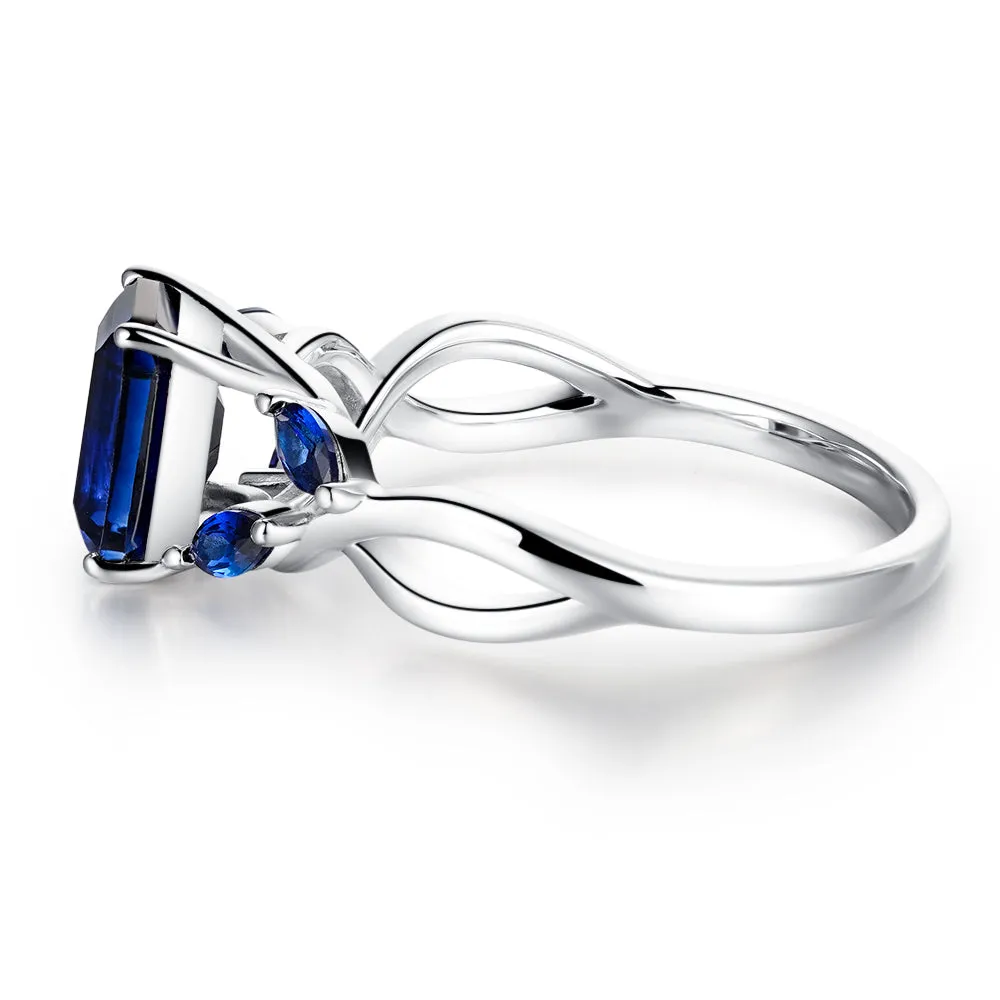 2 CT. Emerald Cut Lab Grown Sapphire Ring with Marquise Sapphire Accents