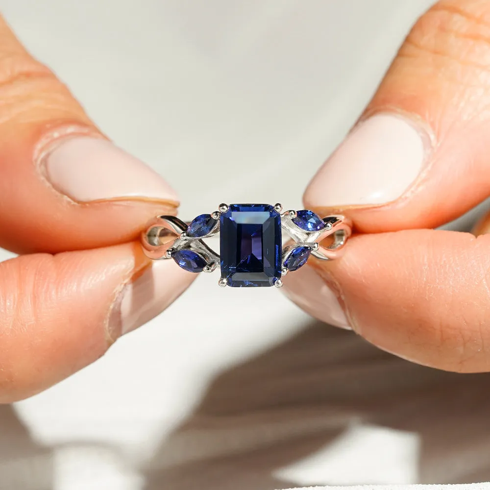 2 CT. Emerald Cut Lab Grown Sapphire Ring with Marquise Sapphire Accents