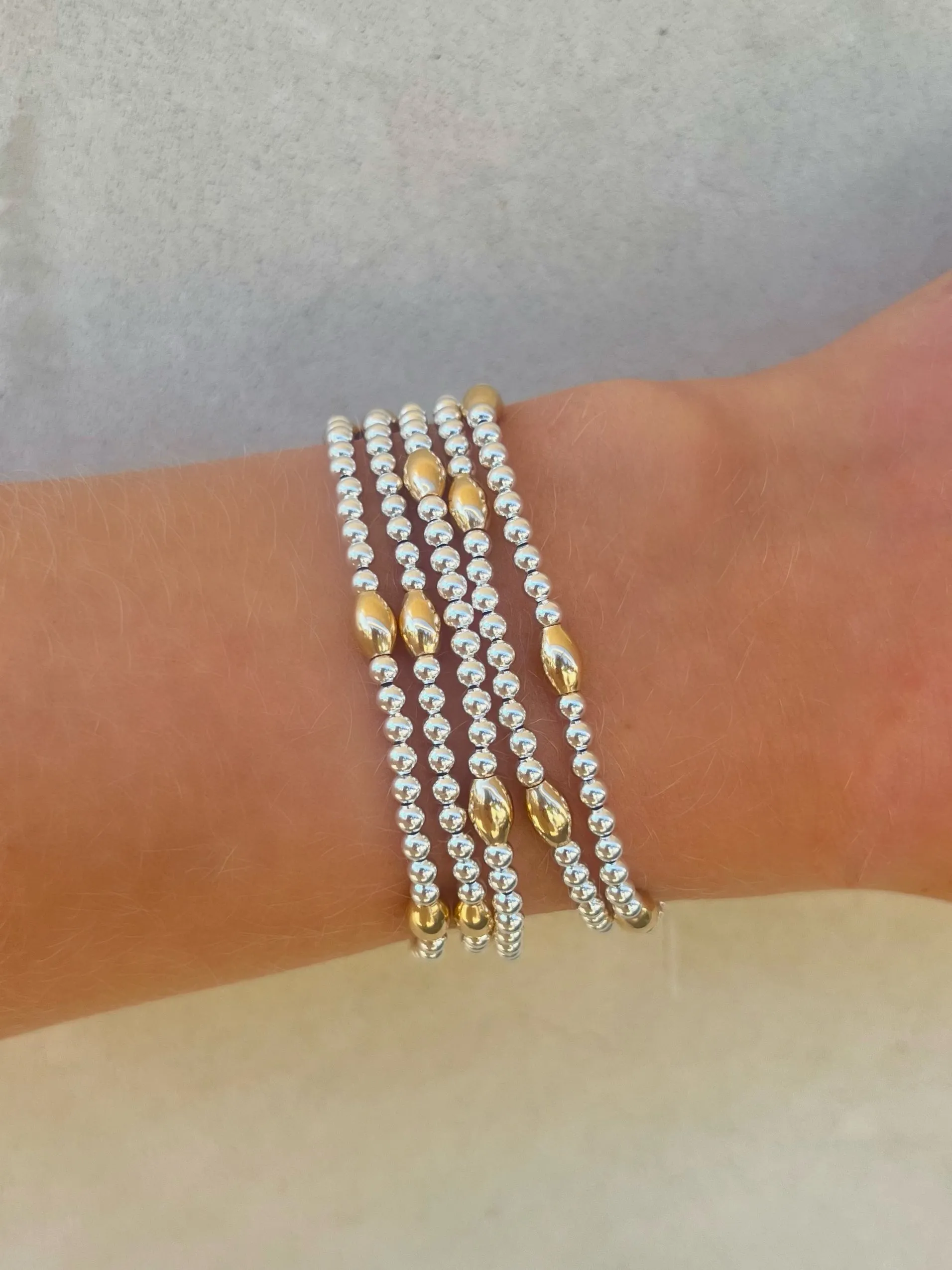 3MM Sterling Silver Filled Bracelet with Yellow Gold Orzo Pattern