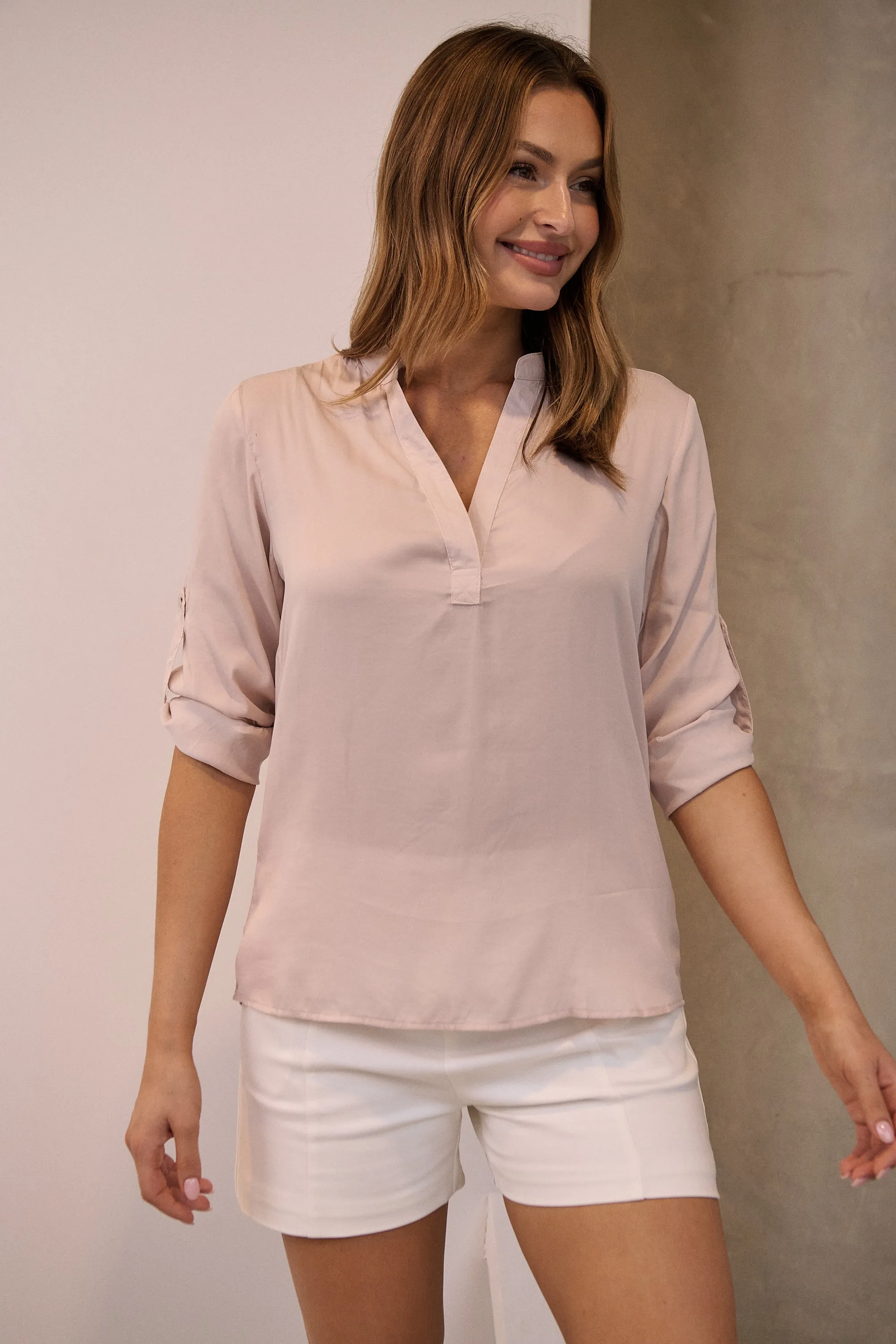 Brialla Blush Satin Roll sleeve shirt