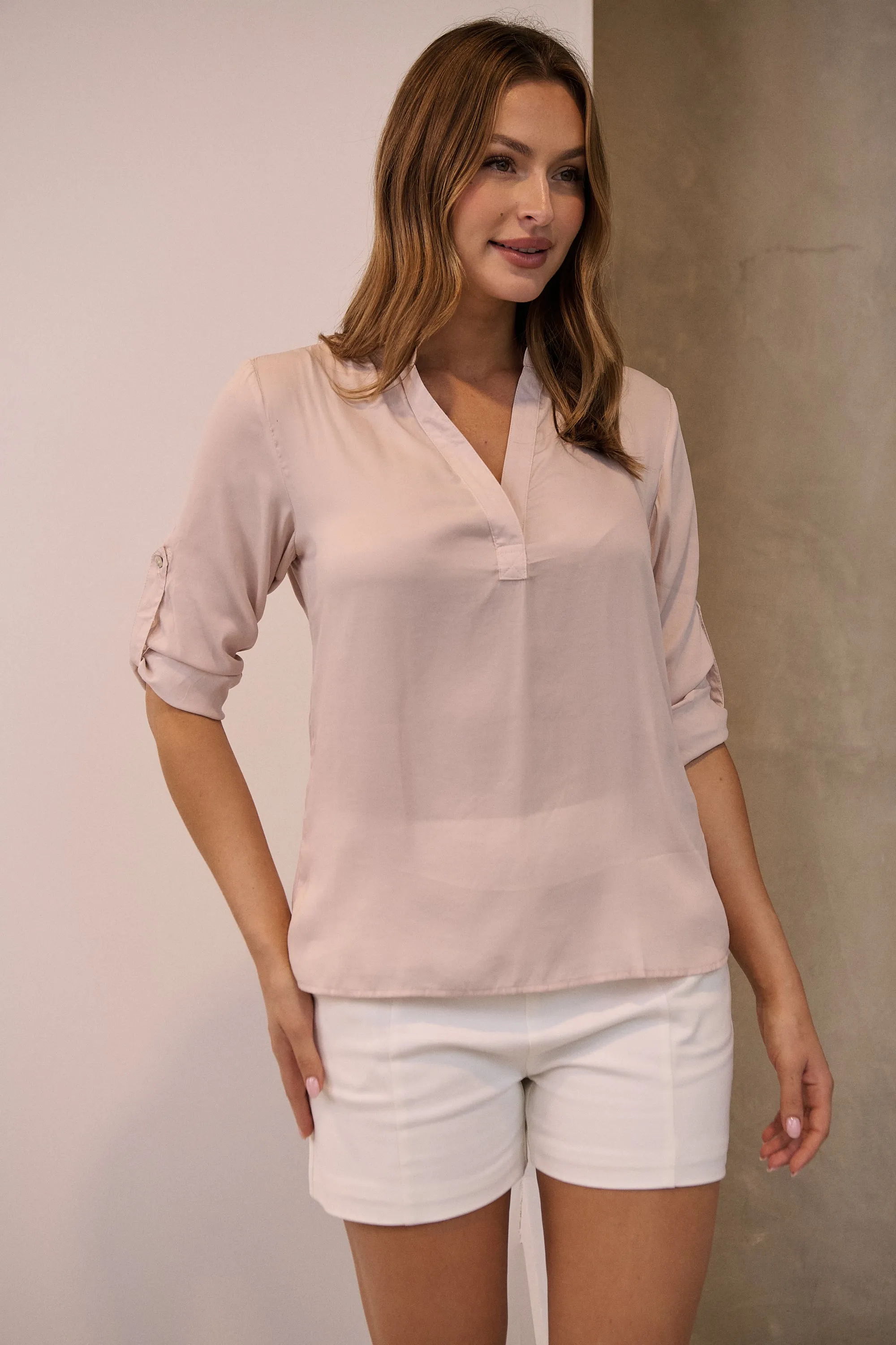 Brialla Blush Satin Roll sleeve shirt