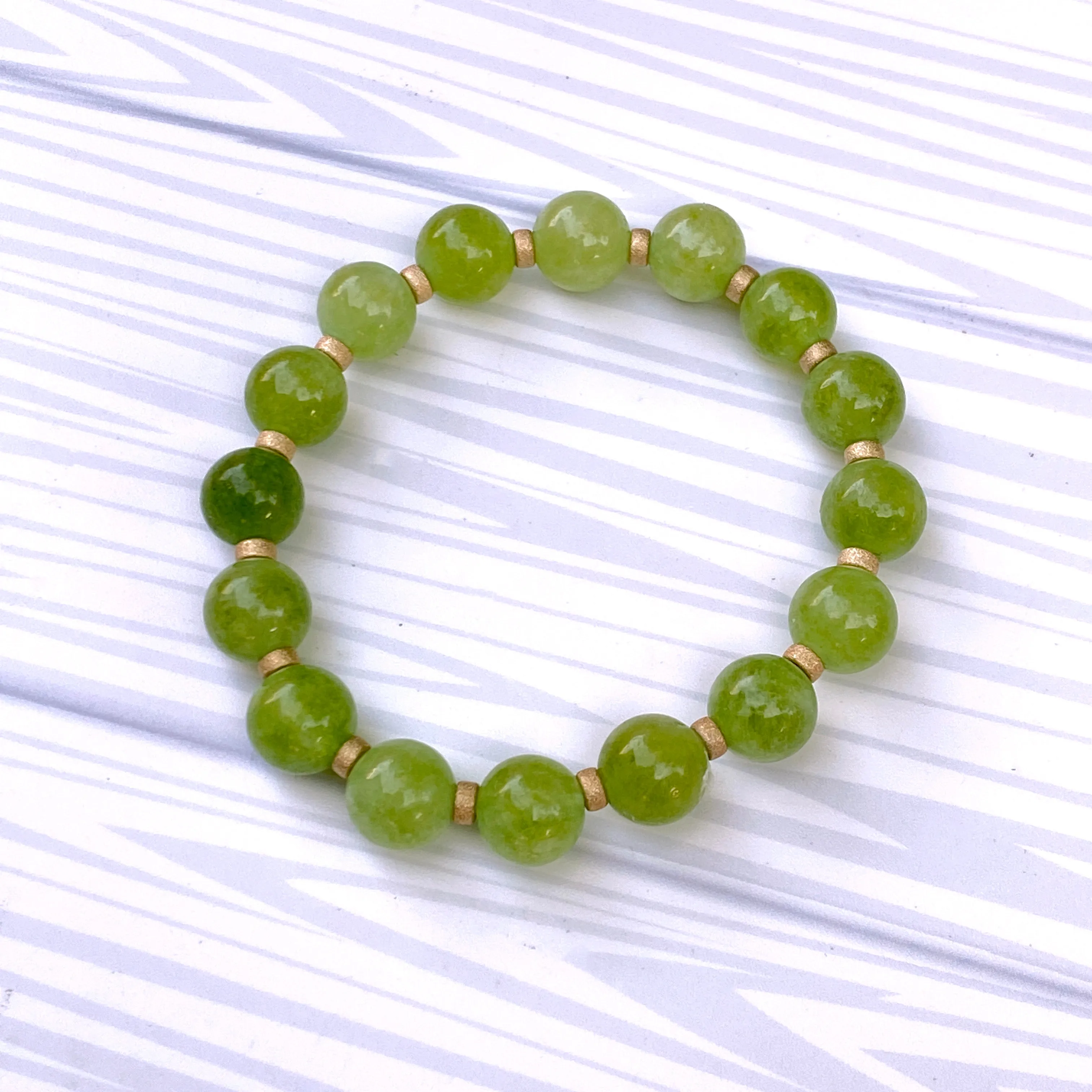 Genuine Peridot gemstone stretch Bracelet with 14kt golf fill