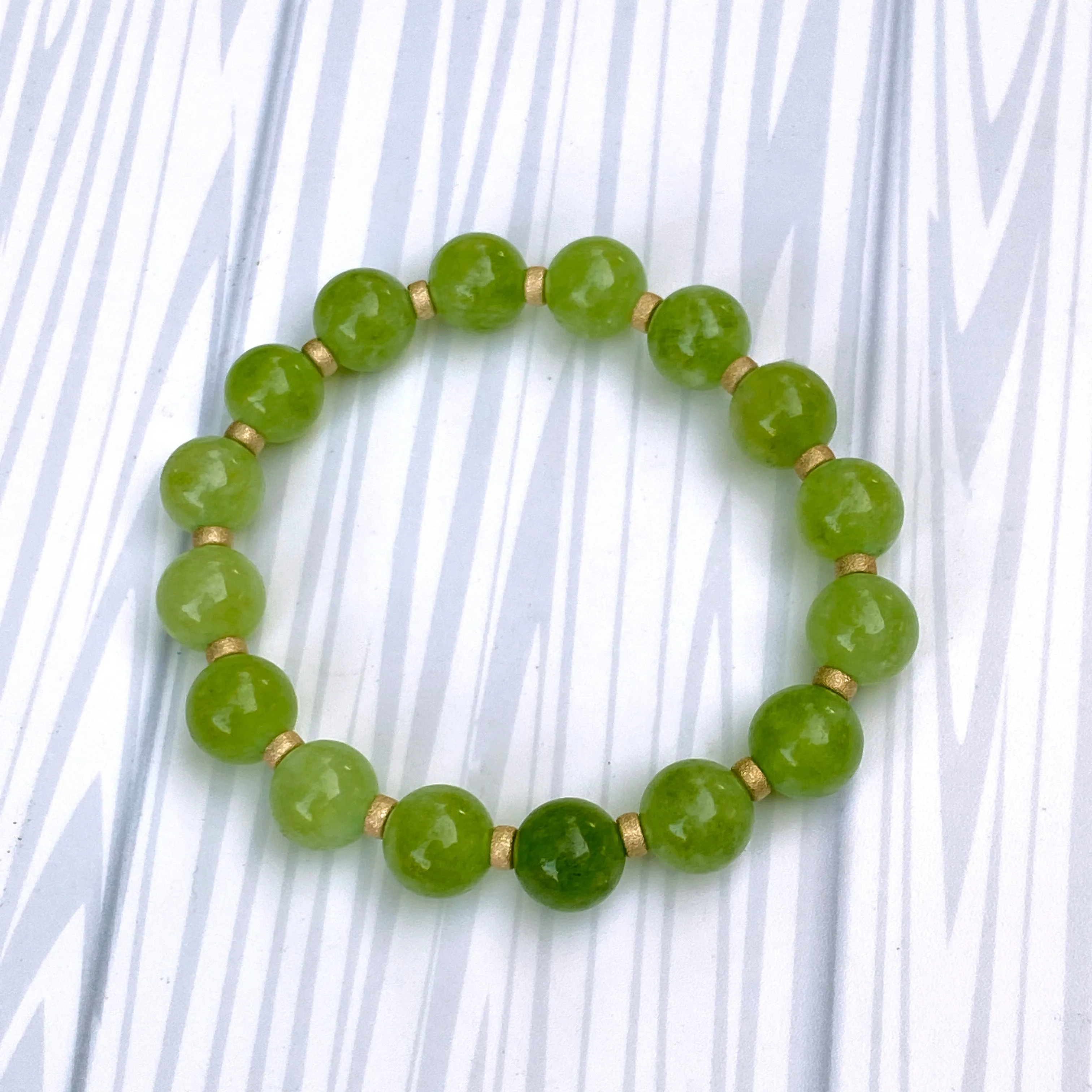 Genuine Peridot gemstone stretch Bracelet with 14kt golf fill