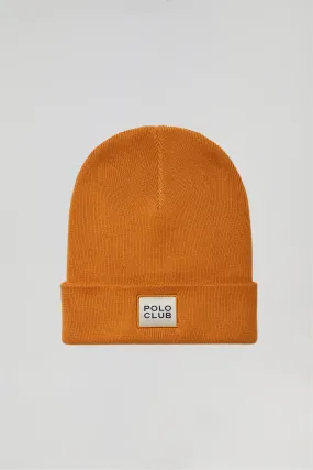 Gorro color cúrcuma de lana unisex con detalle Polo Club