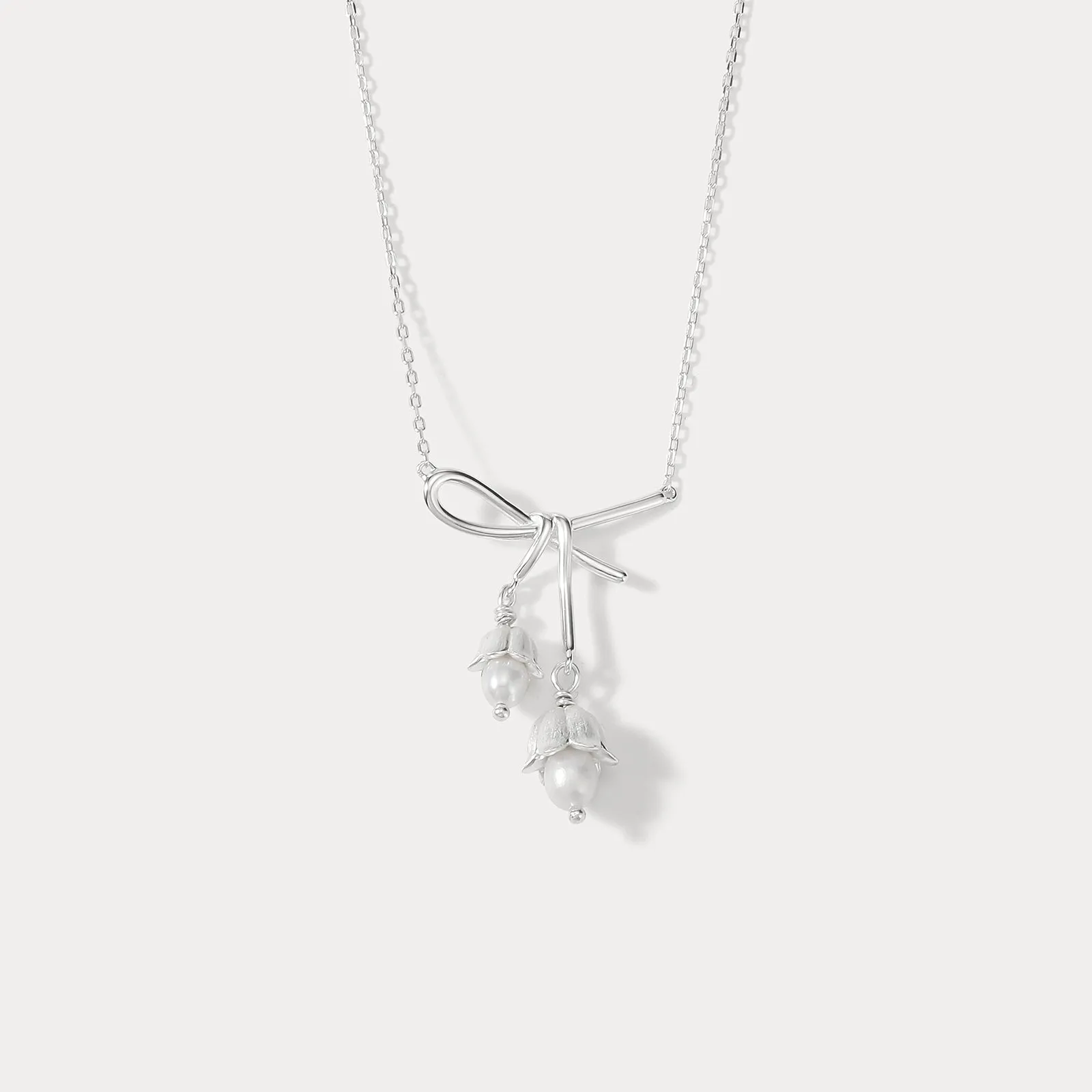 Silver Lily Of The Valley Bow Necklace