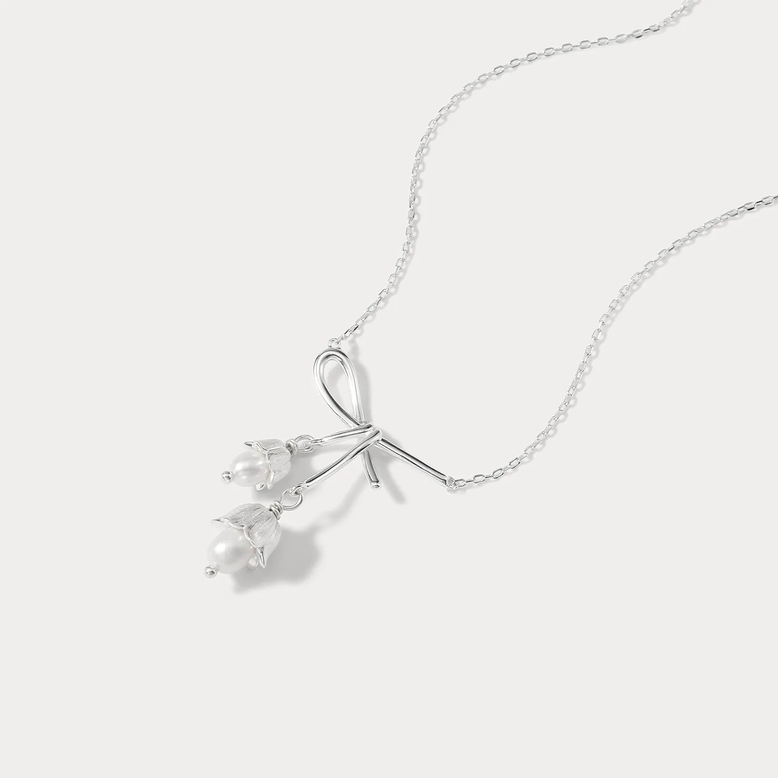 Silver Lily Of The Valley Bow Necklace