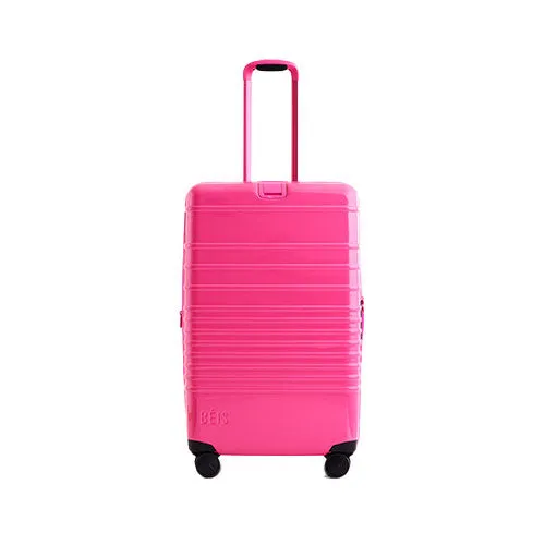 The Medium Check-In Roller in Barbie Pink