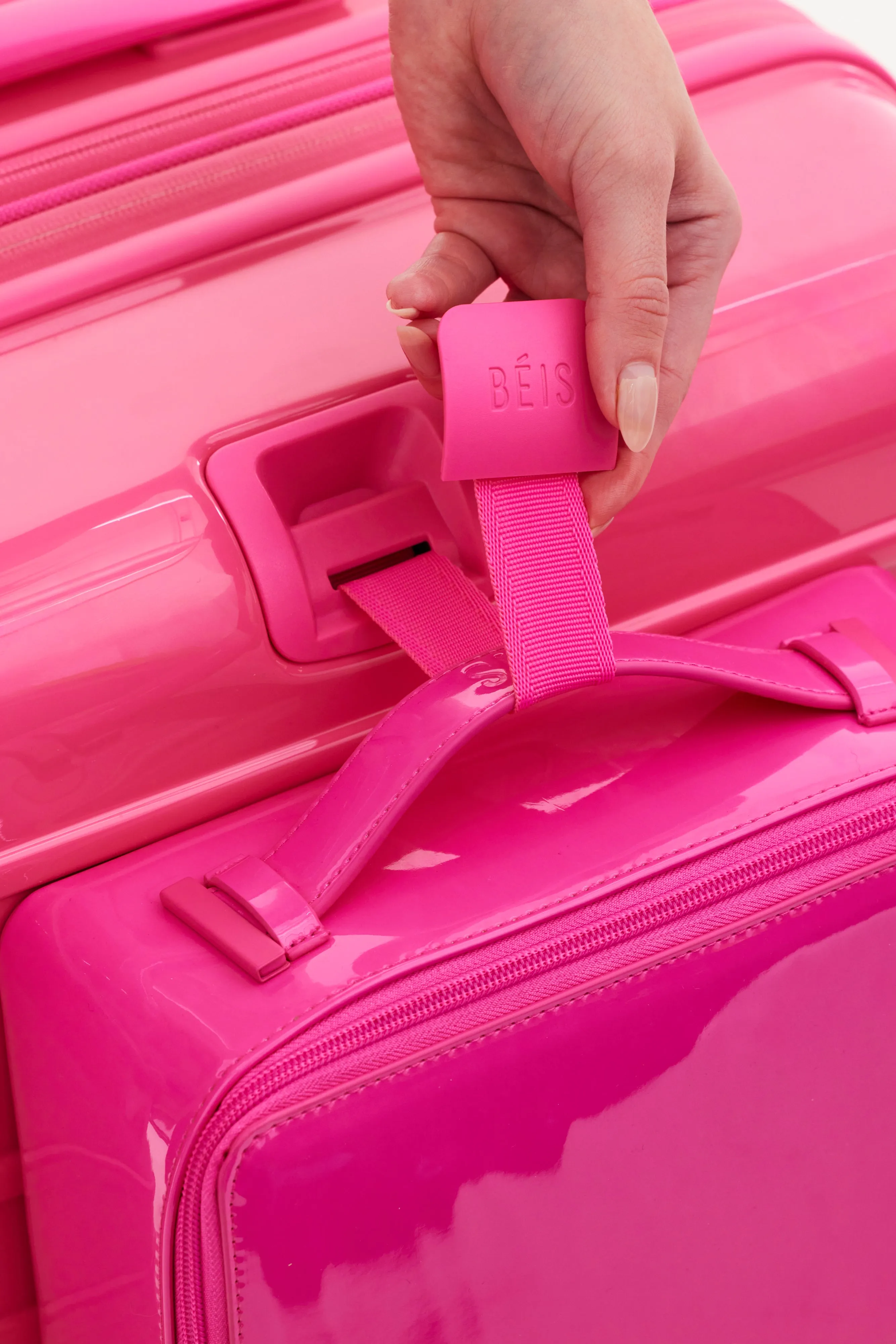 The Medium Check-In Roller in Barbie Pink