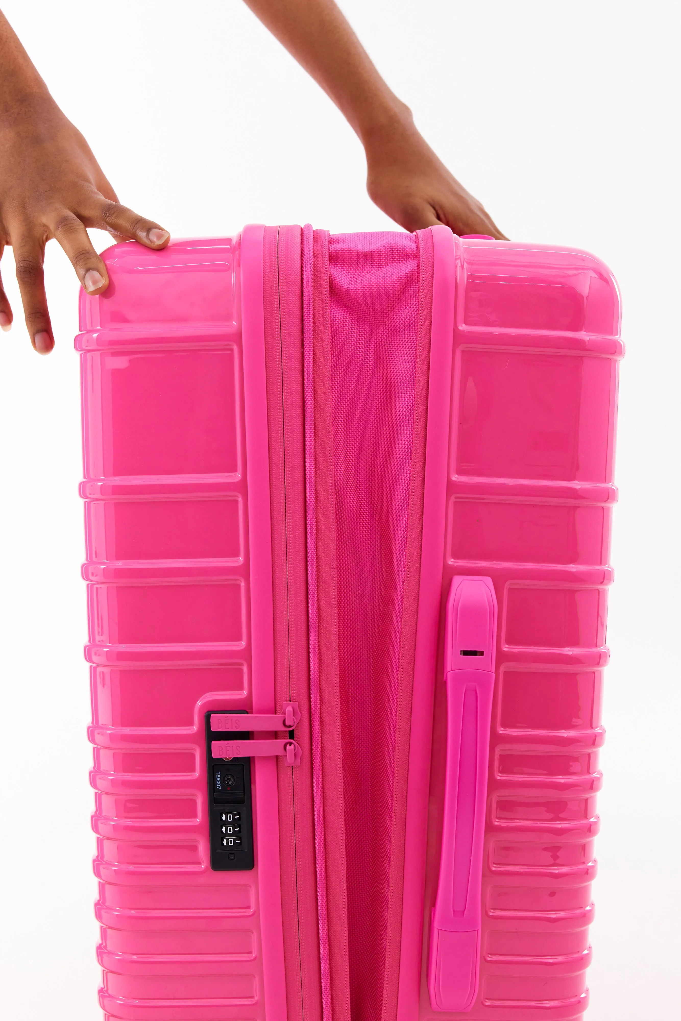 The Medium Check-In Roller in Barbie Pink