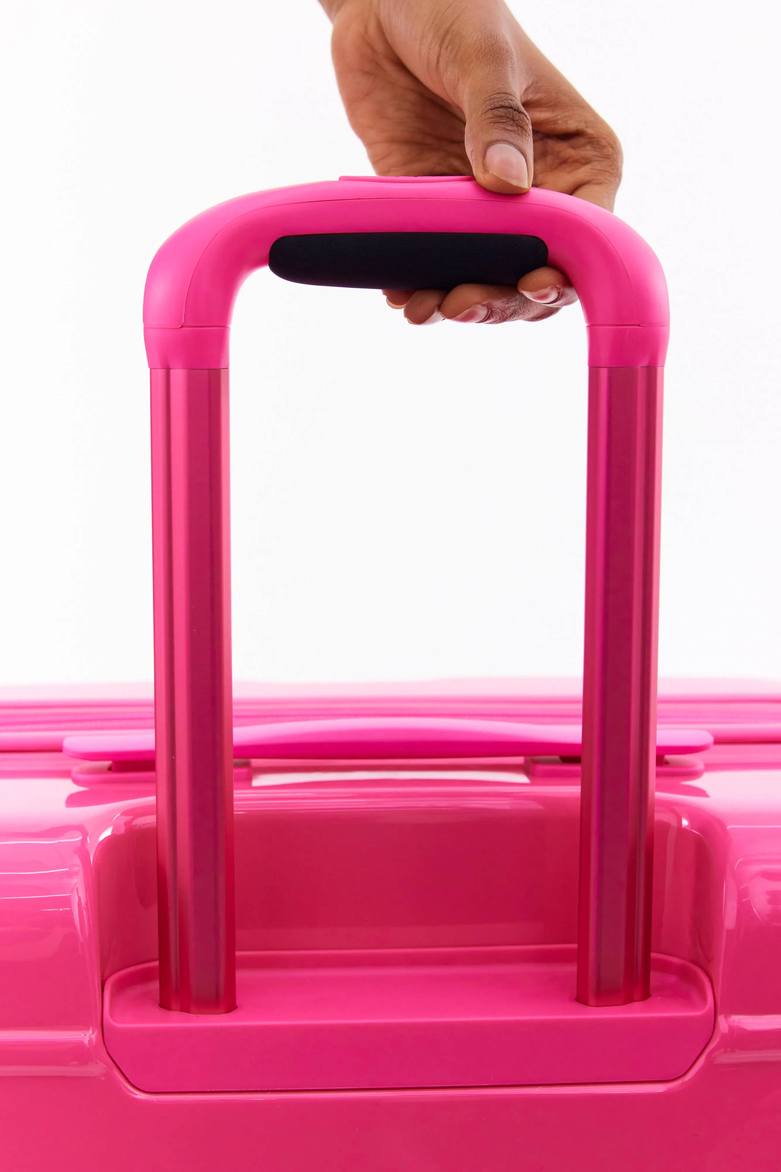 The Medium Check-In Roller in Barbie Pink